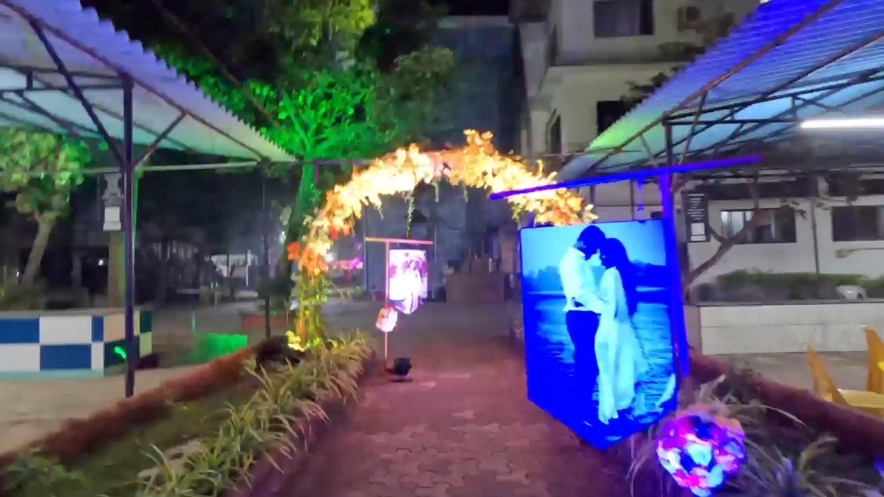 Floral arch and photo display entrance