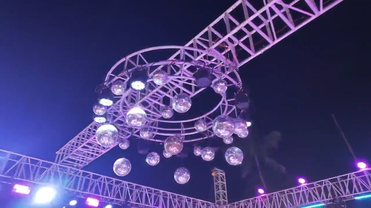 Truss with hanging chandelier balls